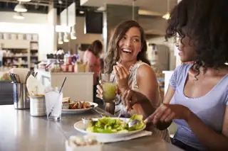 Two Women Enjoying Lunch Date Delicatessen Restaurant