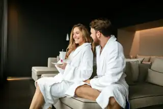 Sun Celebrations Couple Couch Robes Coffee