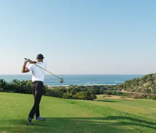 Wild Coast Sun Activities Golf Player On Golf Course 1