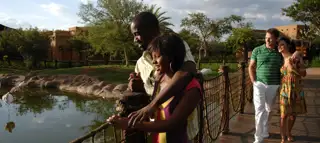 Mero Gardens Couple Enjoying Pond 4